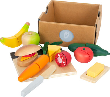 Lunchbox met snijdbare houten groente en fruit