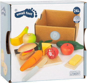 Lunchbox met snijdbare houten groente en fruit